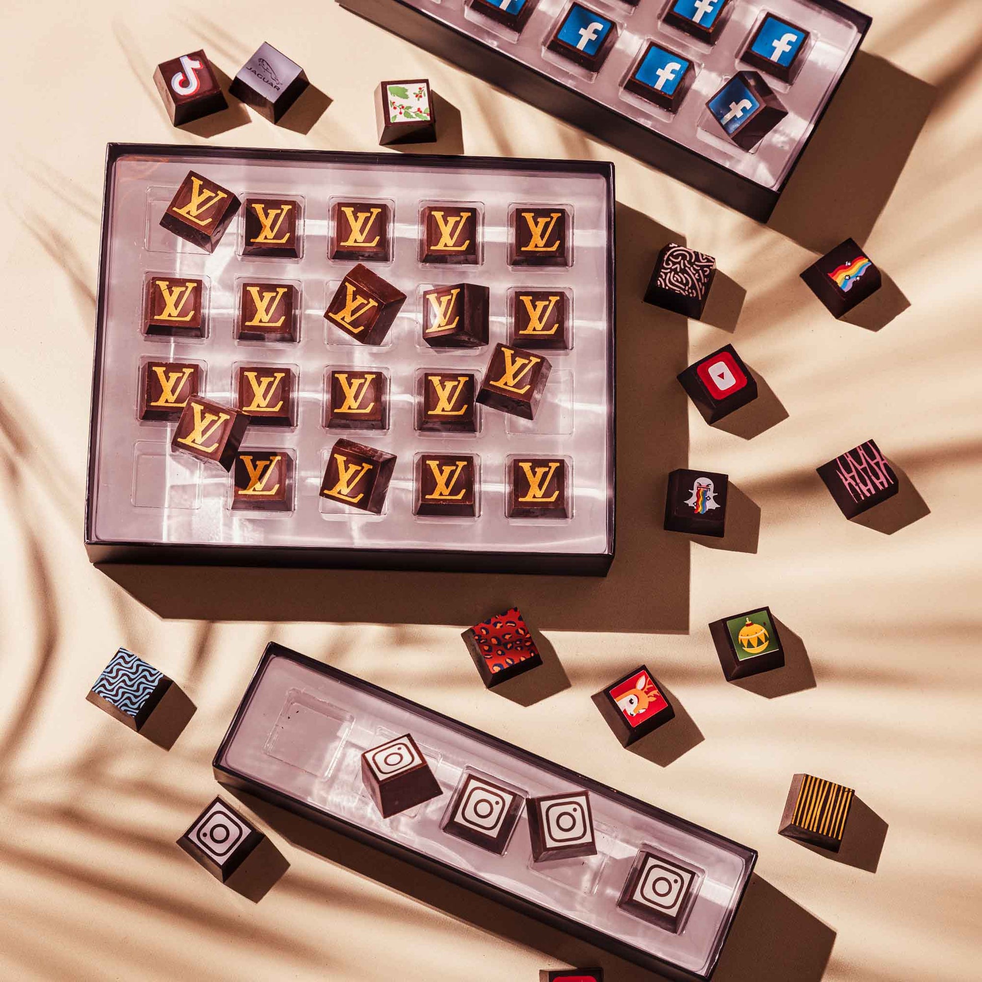 An open box of custom chocolate truffle boxes